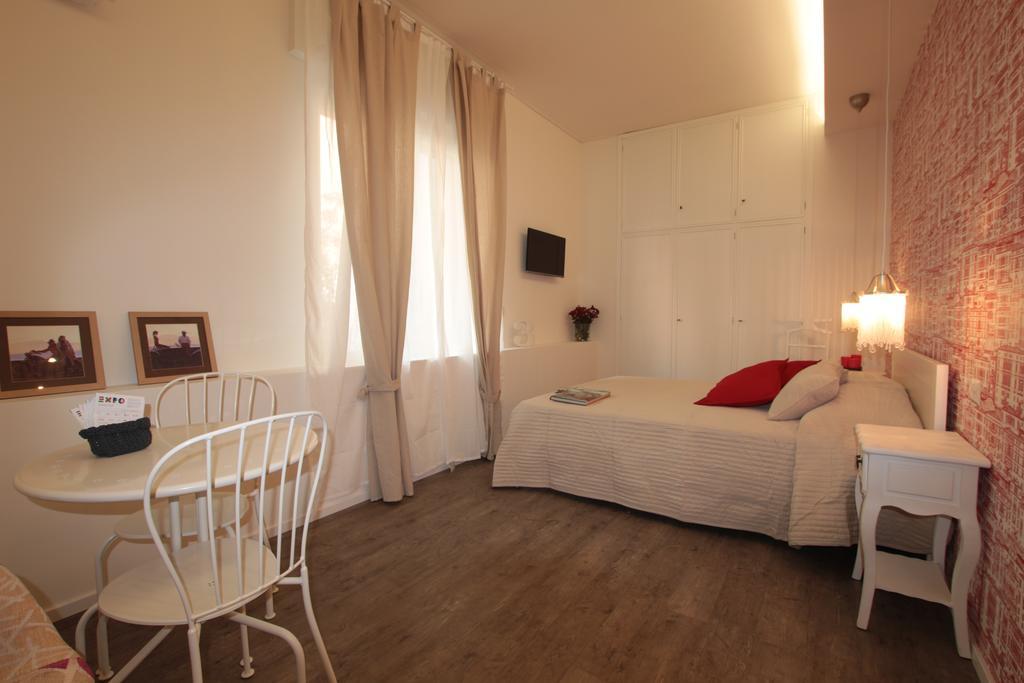 Marcona24 Aparthotel Милано Стая снимка