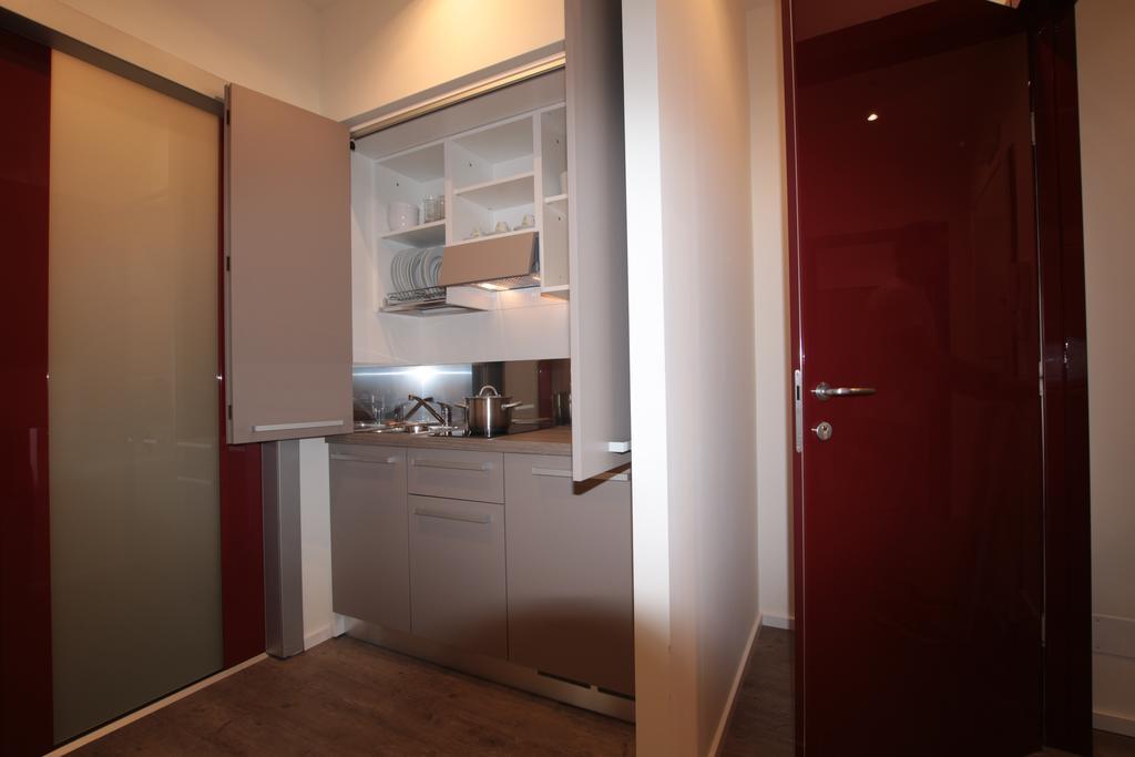 Marcona24 Aparthotel Милано Стая снимка