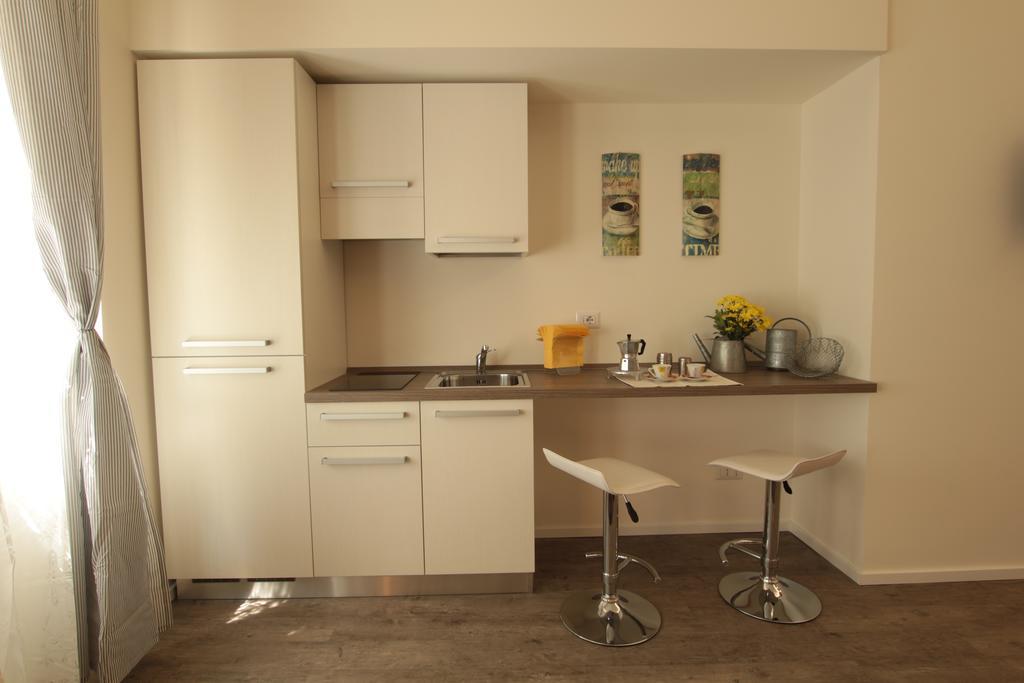 Marcona24 Aparthotel Милано Стая снимка