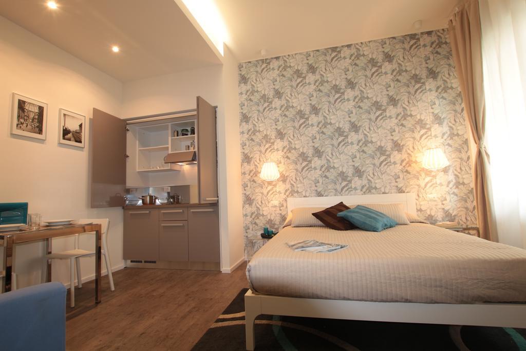 Marcona24 Aparthotel Милано Стая снимка