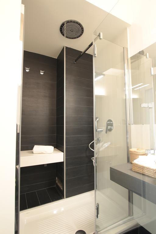 Marcona24 Aparthotel Милано Стая снимка