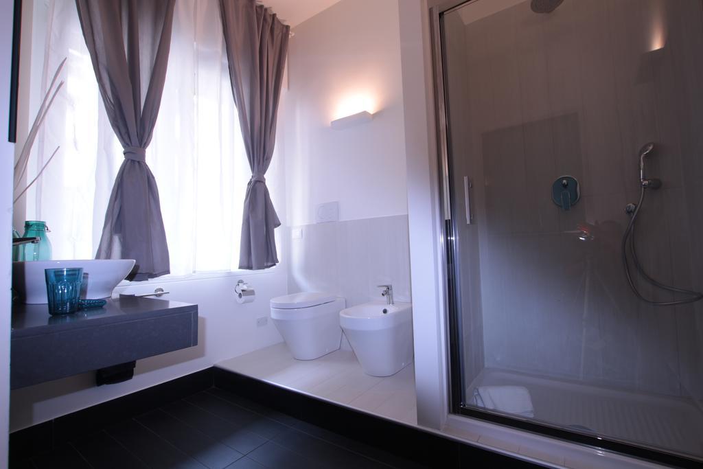 Marcona24 Aparthotel Милано Стая снимка